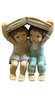 Vorschaubild 1 von Dekofigur Kinder Junge Mädchen Porzellan Figur Buch Charmant