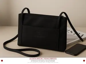 YVES CARREAUX Umhängetasche