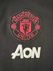 Vorschaubild 2 von Manchester United Poloshirt Herren Kurzarm Logo Print Schwarz S