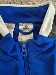 Vorschaubild 3 von Trainingsjacke Kinder Gr. 116 Blau Weiß Schwarz Sportjacke